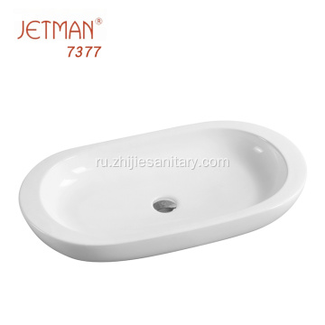 Белая керамическая раковина для ванной комнаты